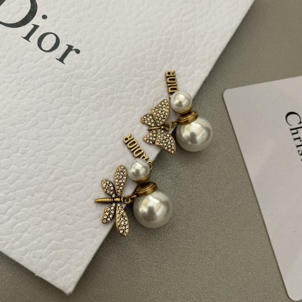 VE9925 Gold plated asymmetric moth pearl Dior earrings