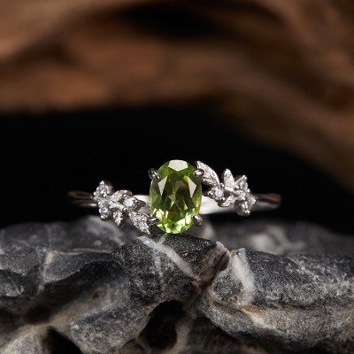 RS9939-1 S925 silver, natural Peridot, platinum tone leaf ring, adjustable